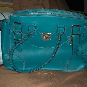 Brand new without tags teal bag Charming Charlies